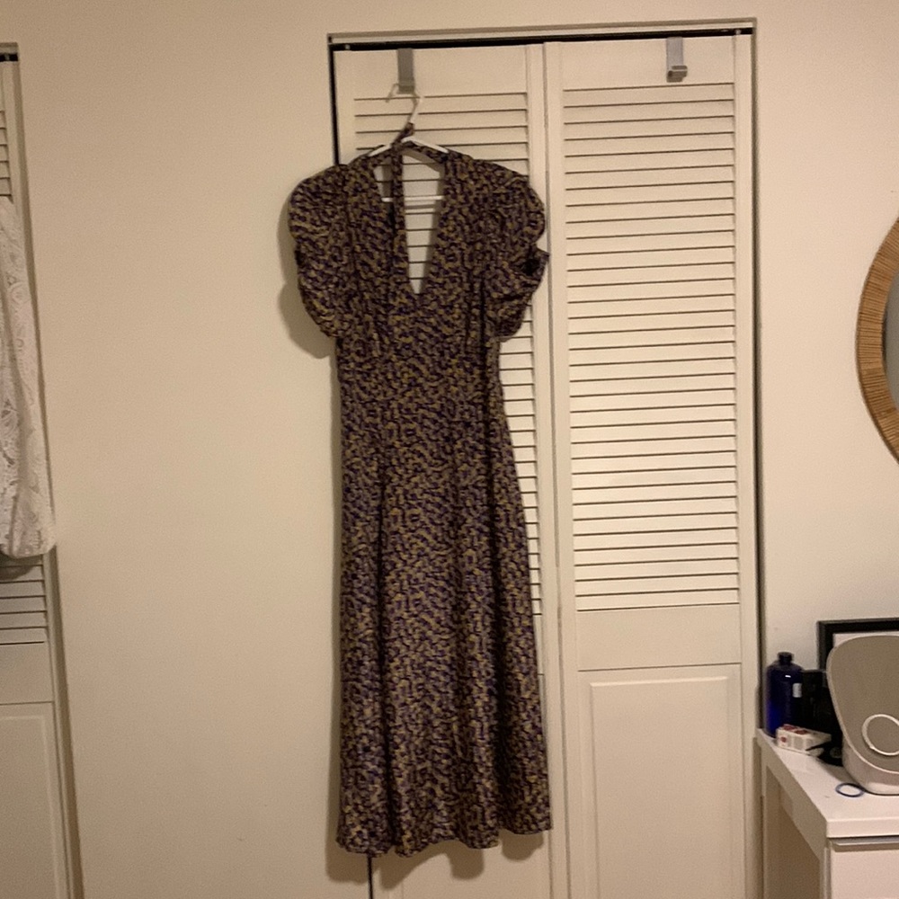 Purple dress with open back and bow at neck